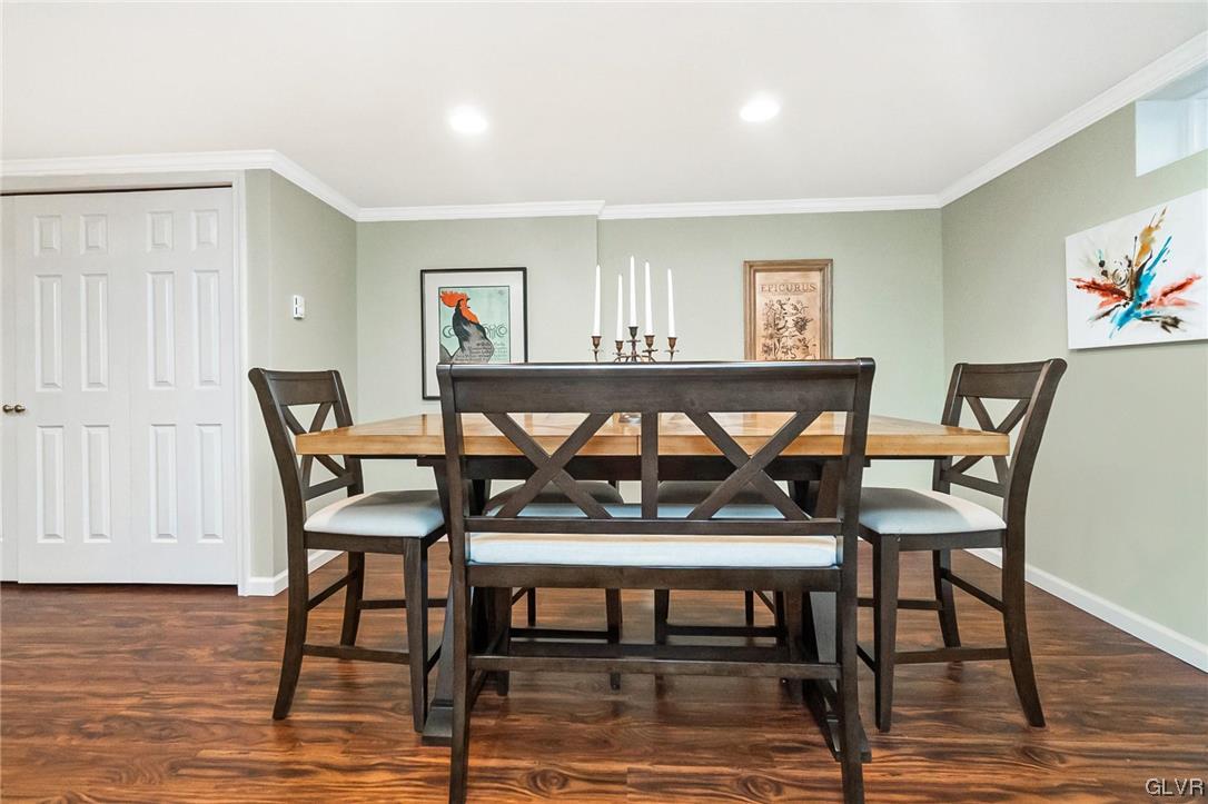 2285 Woodbarn Road Lower Macungie Township, PA 18062 - Photo 38 of 45 a view of a dining room with furniture and wooden floor