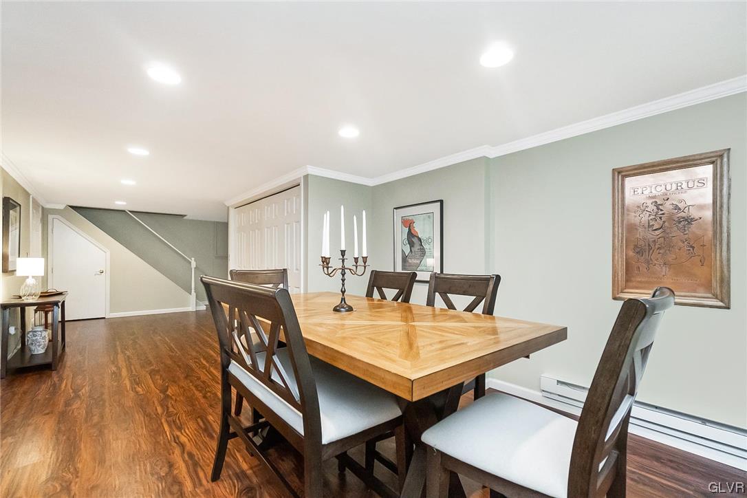 2285 Woodbarn Road Lower Macungie Township, PA 18062 - Photo 39 of 45 a view of a dining room with furniture and wooden floor