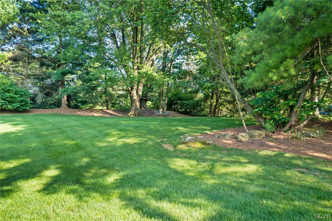 2285 Woodbarn Road Lower Macungie Township, PA 18062 - Photo 45 of 45 a view of a grassy field with trees