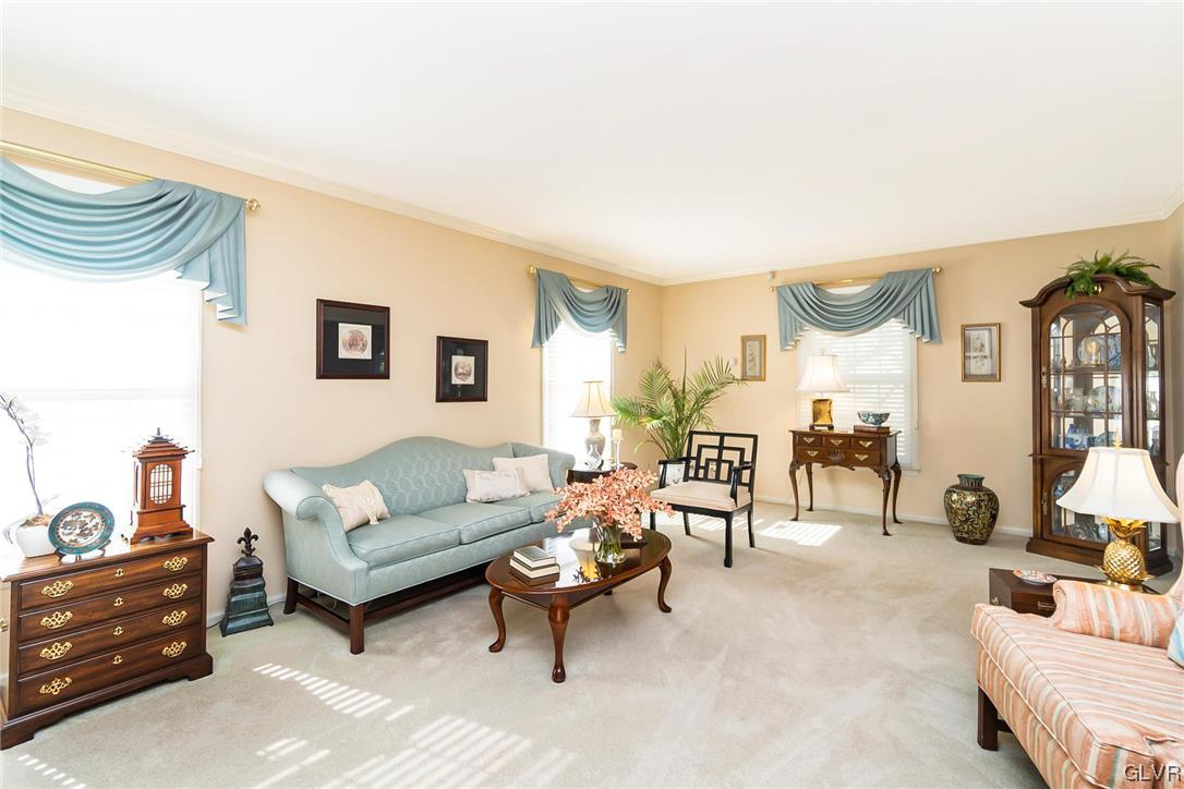 2285 Woodbarn Road Lower Macungie Township, PA 18062 - Photo 6 of 45 a living room with furniture and a lamp