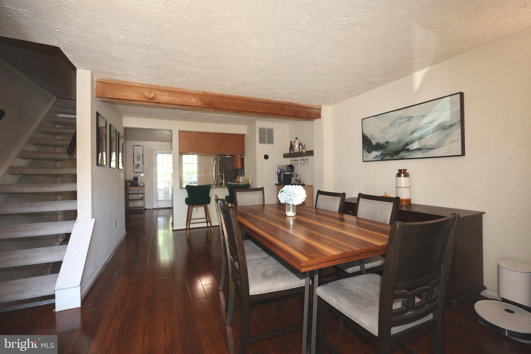 1939 Belmont Ridge Court Reston, VA 20191 - Photo 2 of 14 a view of a dining room with furniture and wooden floor