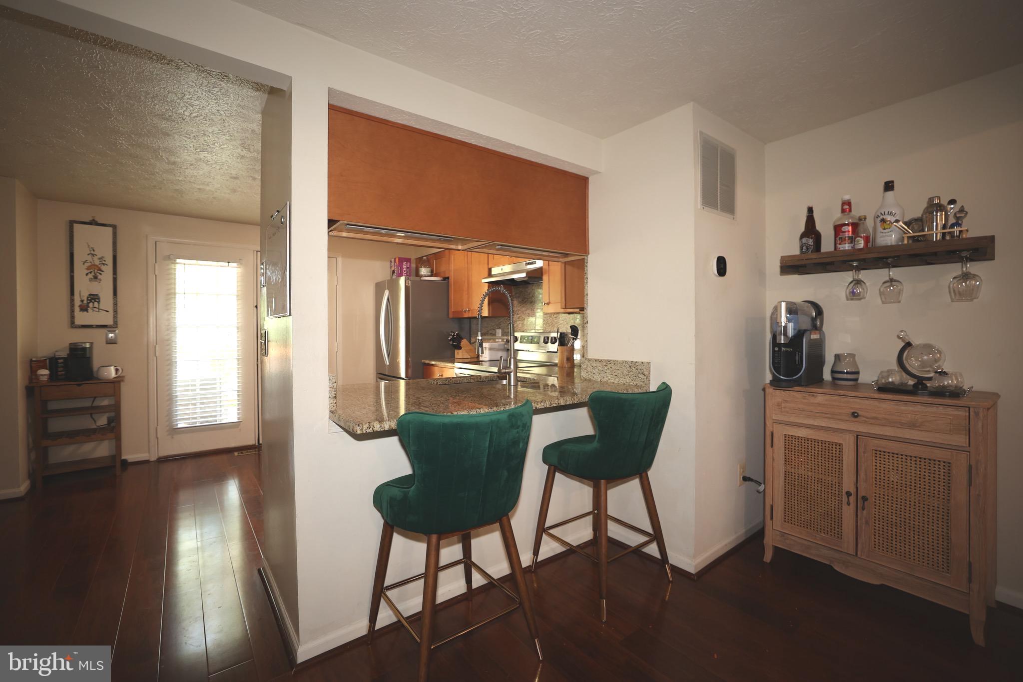 1939 Belmont Ridge Court Reston, VA 20191 - Photo 3 of 14 a dining room with furniture and window