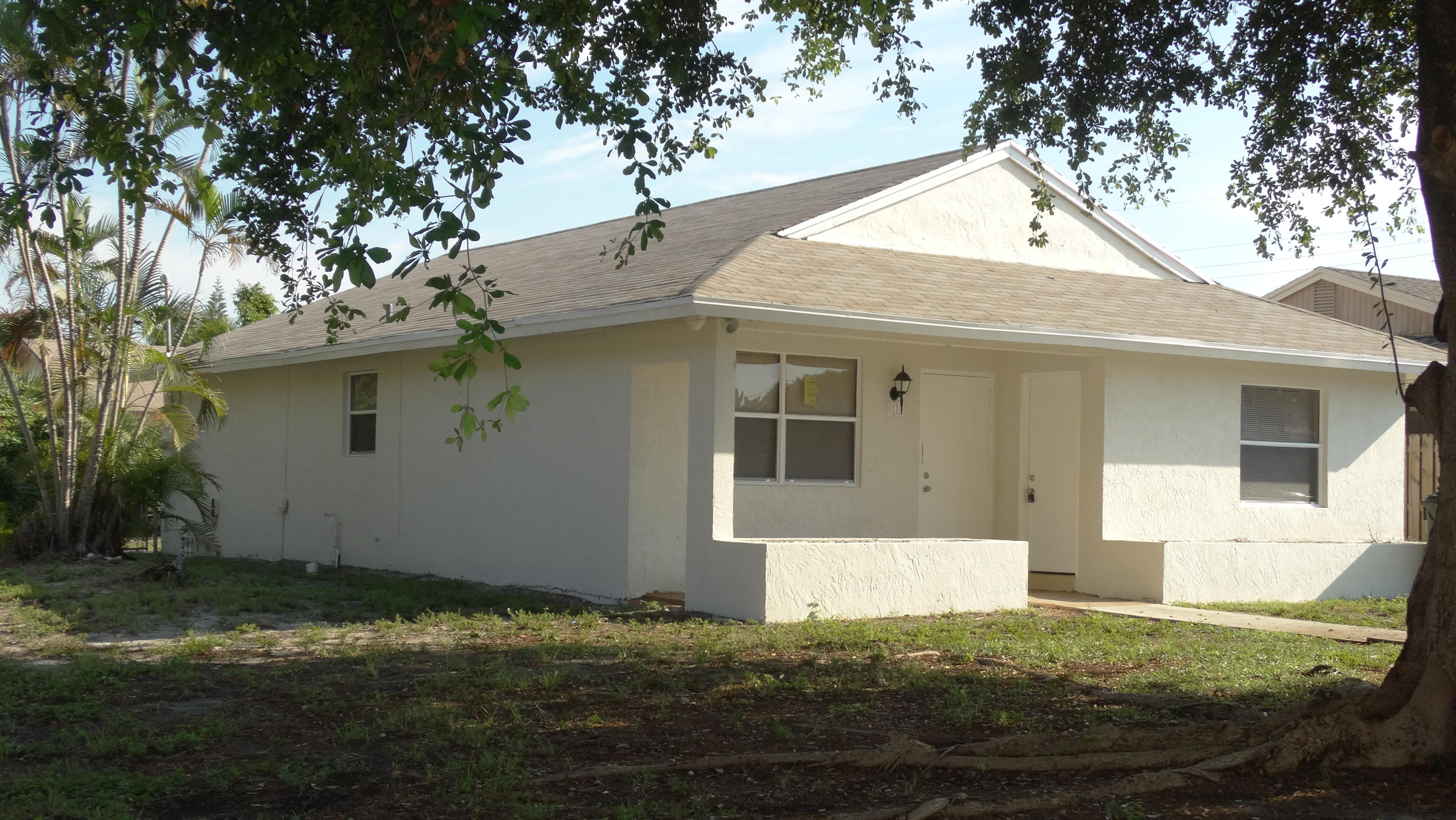 301 Northeast 36th Street Boca Raton, FL 33431 - Photo 1 of 24 Front
