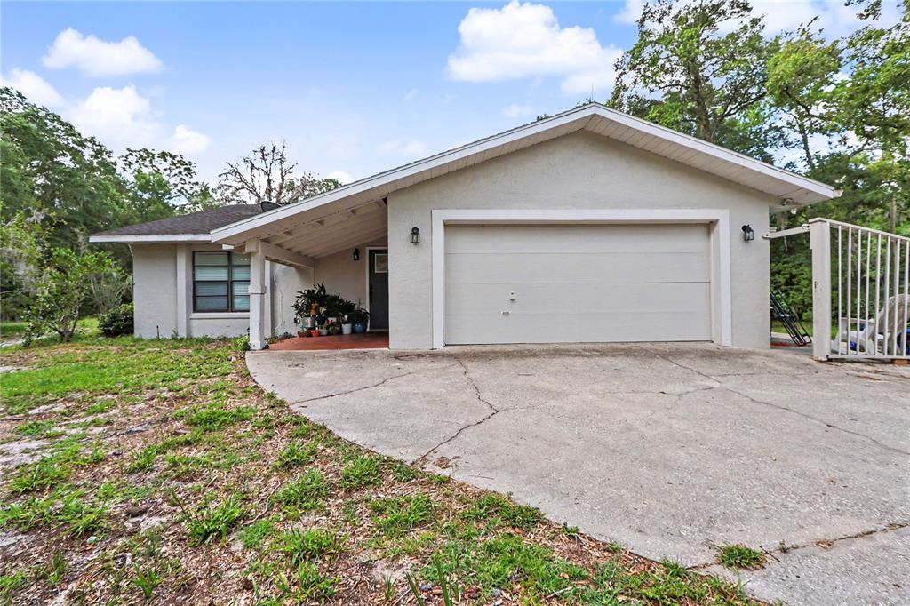 20250 Southwest 93rd Lane Road Dunnellon, FL 34431 - Photo 1 of 49