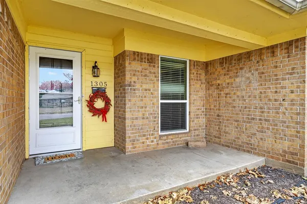 a front view of a house with a garage
