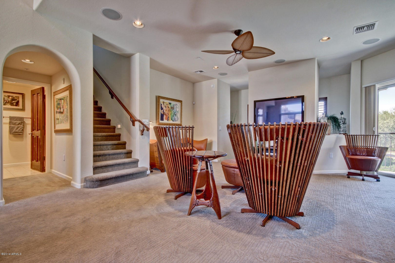 3935 East Rough Rider Road, Unit 1089 Phoenix, AZ 85050 - Photo 9 of 71 a view of empty room with stairs and furniture