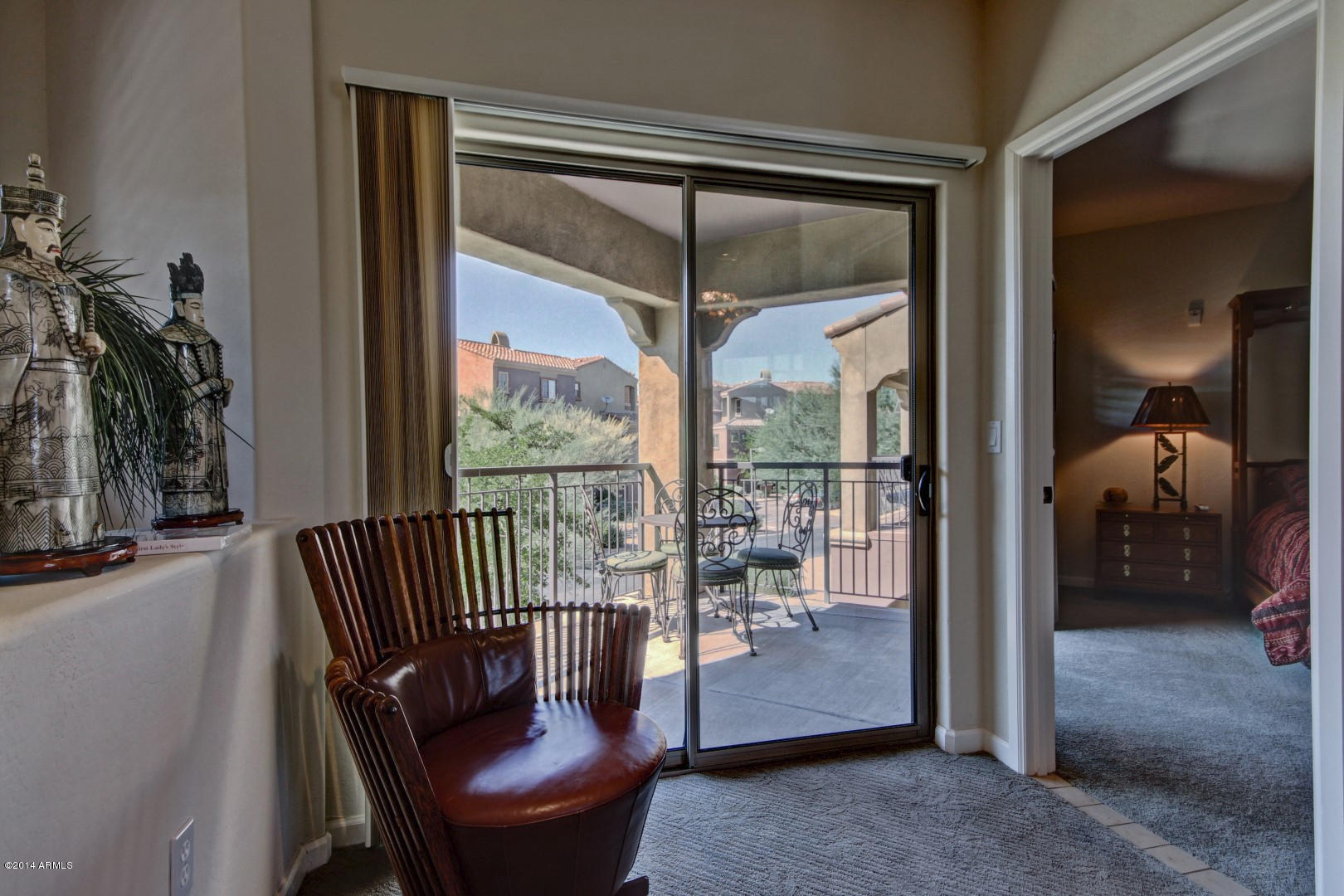 3935 East Rough Rider Road, Unit 1089 Phoenix, AZ 85050 - Photo 10 of 71 a living room with furniture and a window