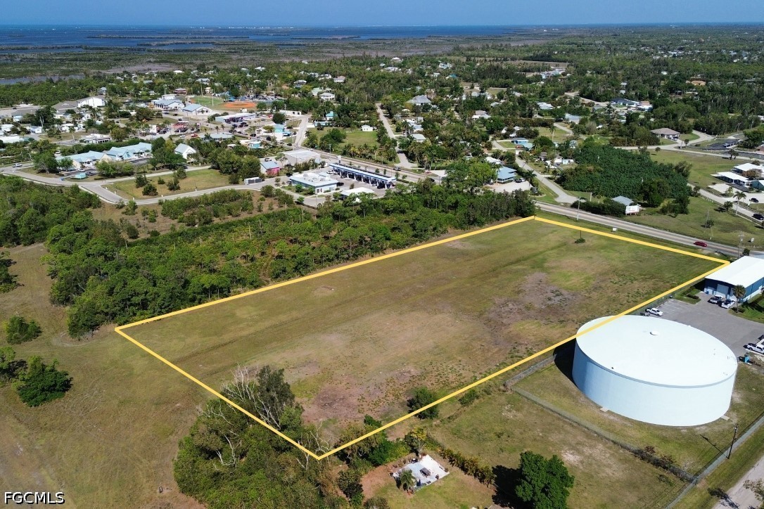 5361 Pine Island Road Bokeelia, FL 33922 - Photo 3 of 10 an aerial view of a residential houses