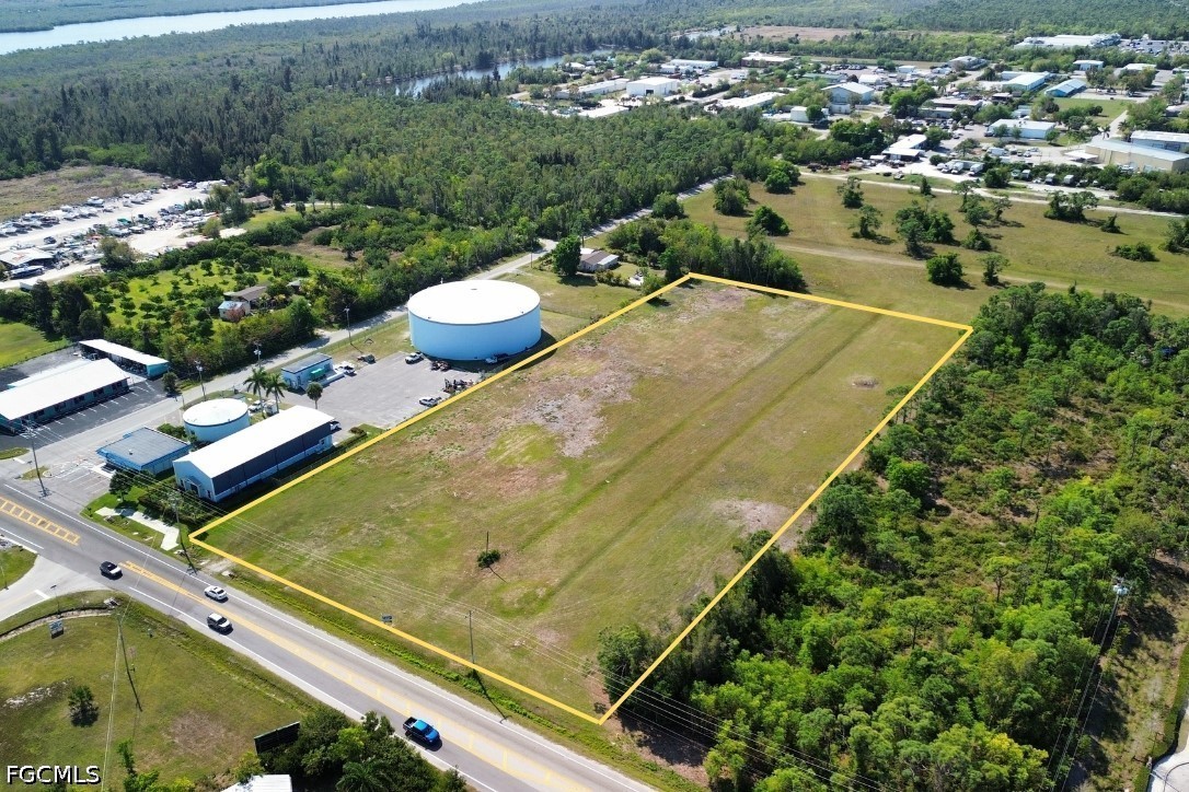 5361 Pine Island Road Bokeelia, FL 33922 - Photo 7 of 10 an aerial view of a residential houses with outdoor space