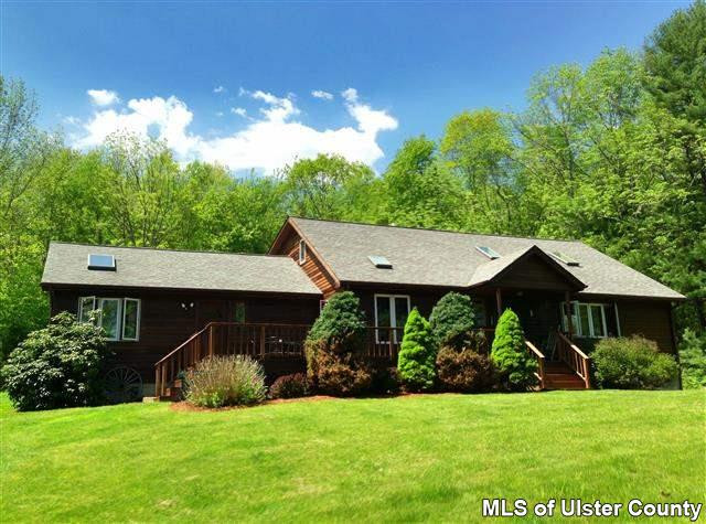 219 Cherry Hill Road Accord, NY 12404 - Photo 1 of 15 a front view of a house with yard and green space