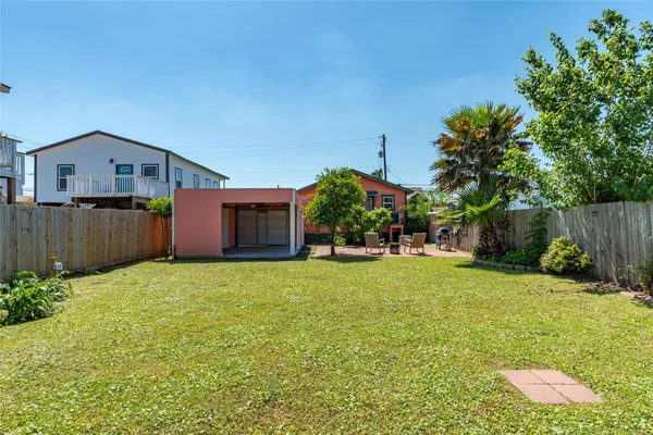 a house view with a garden space