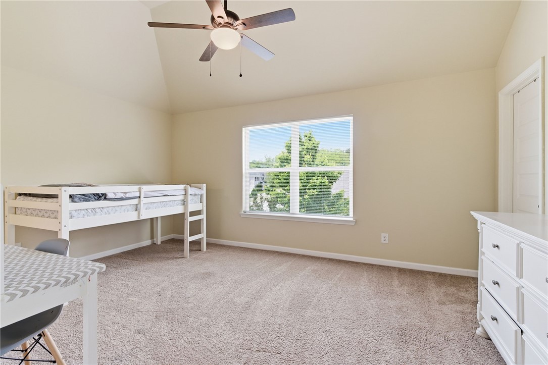 138 Buckland Drive Anderson, SC 29621 - Photo 38 of 49 This spacious bedroom offers ample natural light and a vaulted ceiling.
