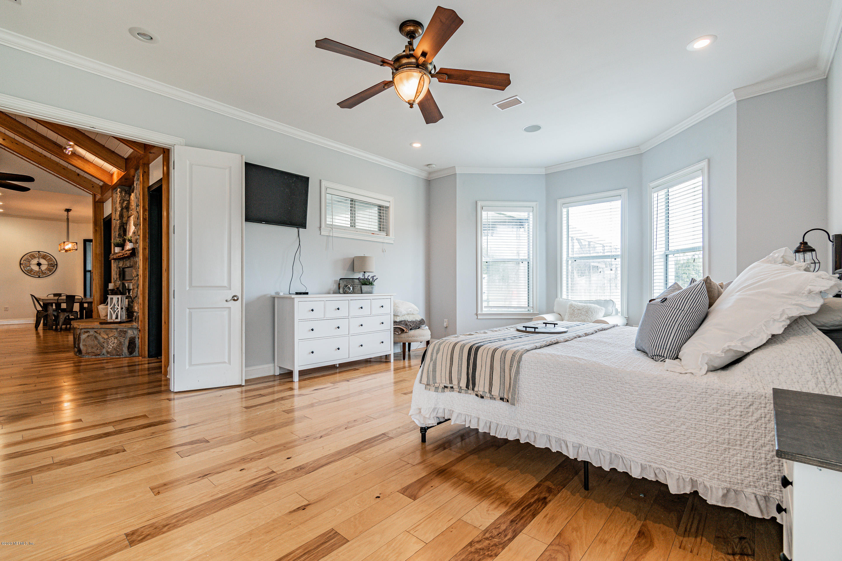 14689 Diamond Ranch Drive Jacksonville, FL 32234 - Photo 31 of 76 a living room with furniture and a large window