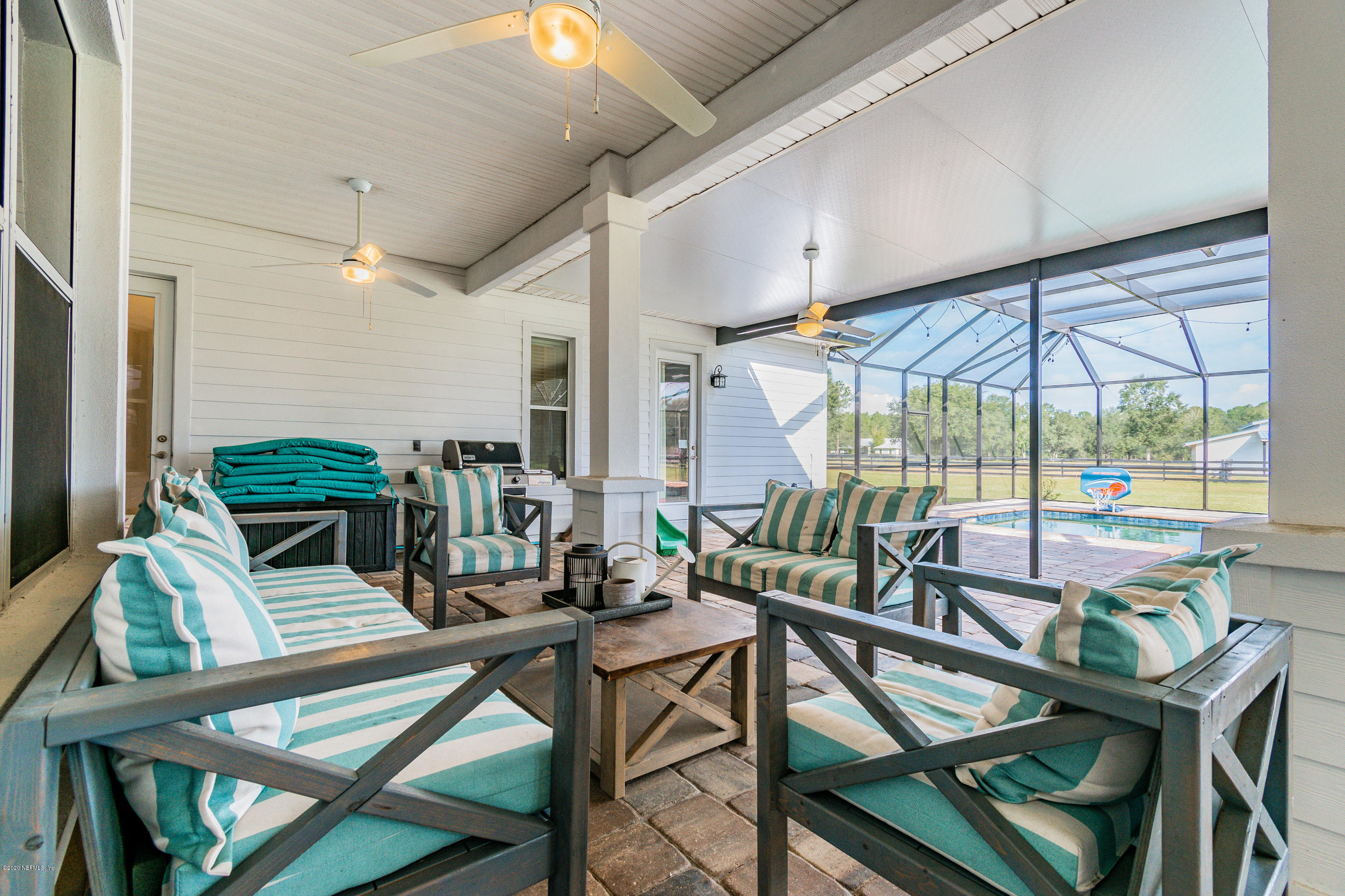 14689 Diamond Ranch Drive Jacksonville, FL 32234 - Photo 55 of 76 a view of a dining room with furniture window and outside view