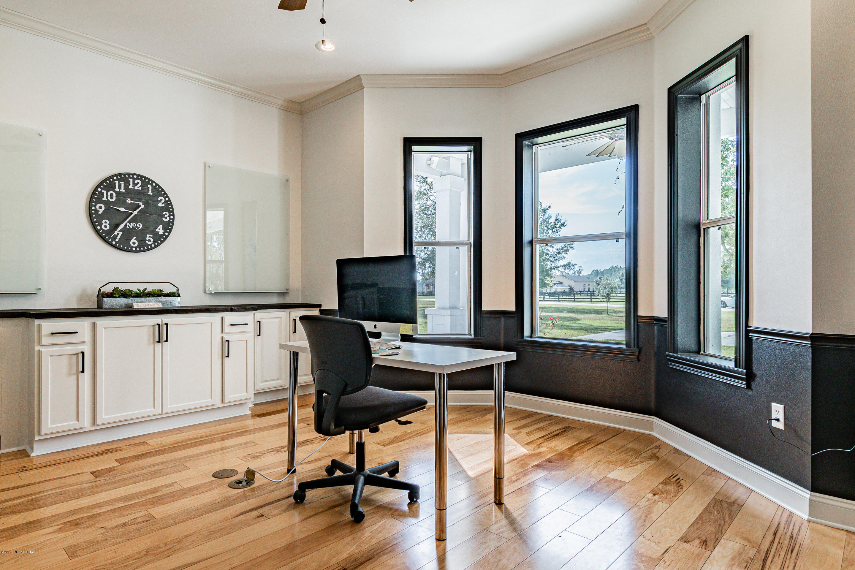 14689 Diamond Ranch Drive Jacksonville, FL 32234 - Photo 10 of 76 a view of a workspace with furniture and a window