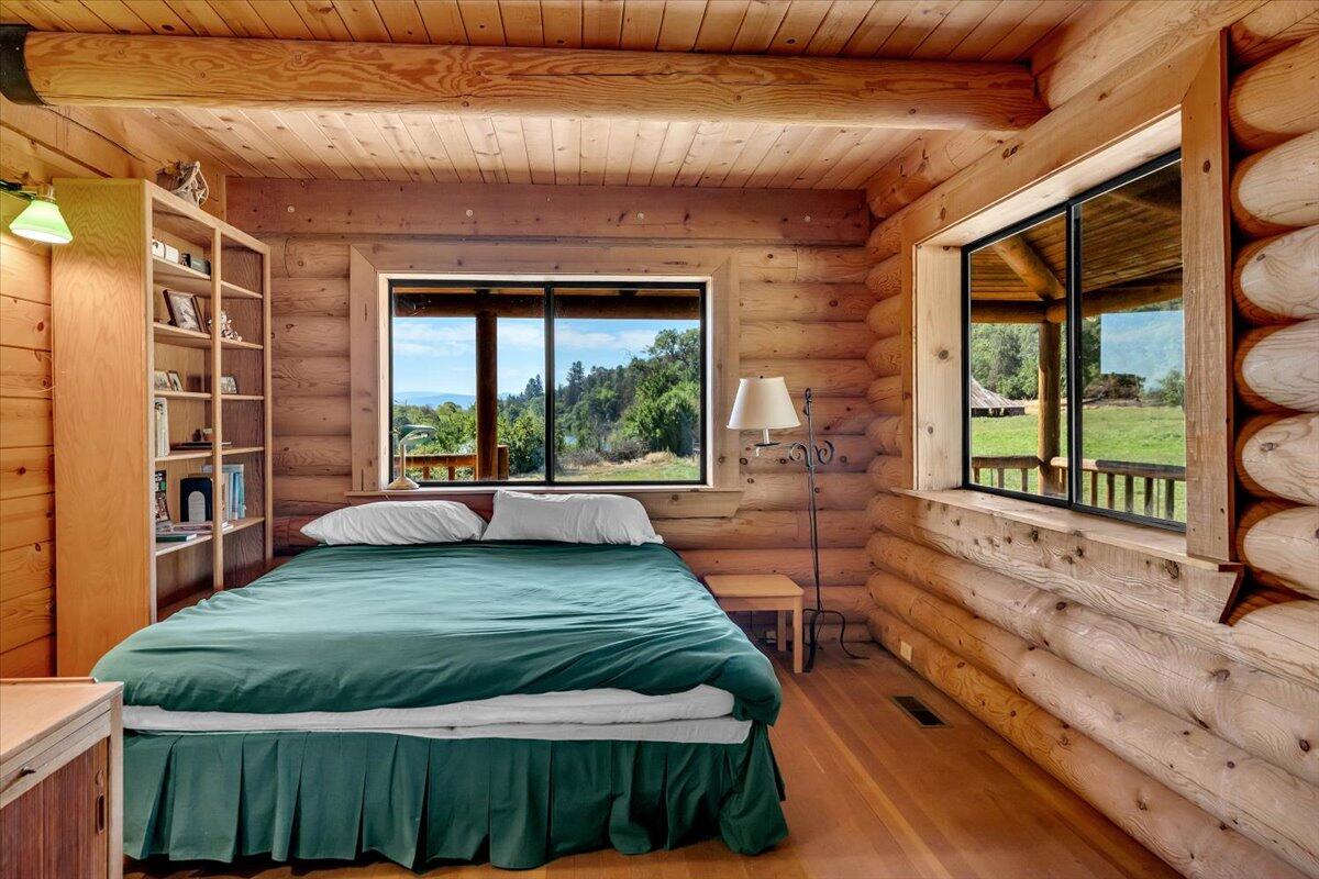 25653 Glenburn Road Fall River Mills, CA 96028 - Photo 26 of 152 a view of a livingroom with furniture and staircase