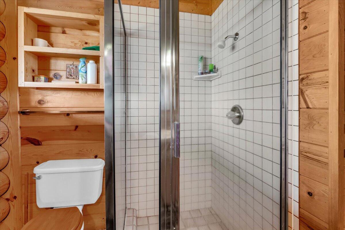 25653 Glenburn Road Fall River Mills, CA 96028 - Photo 29 of 152 a bathroom with a toilet and a shower