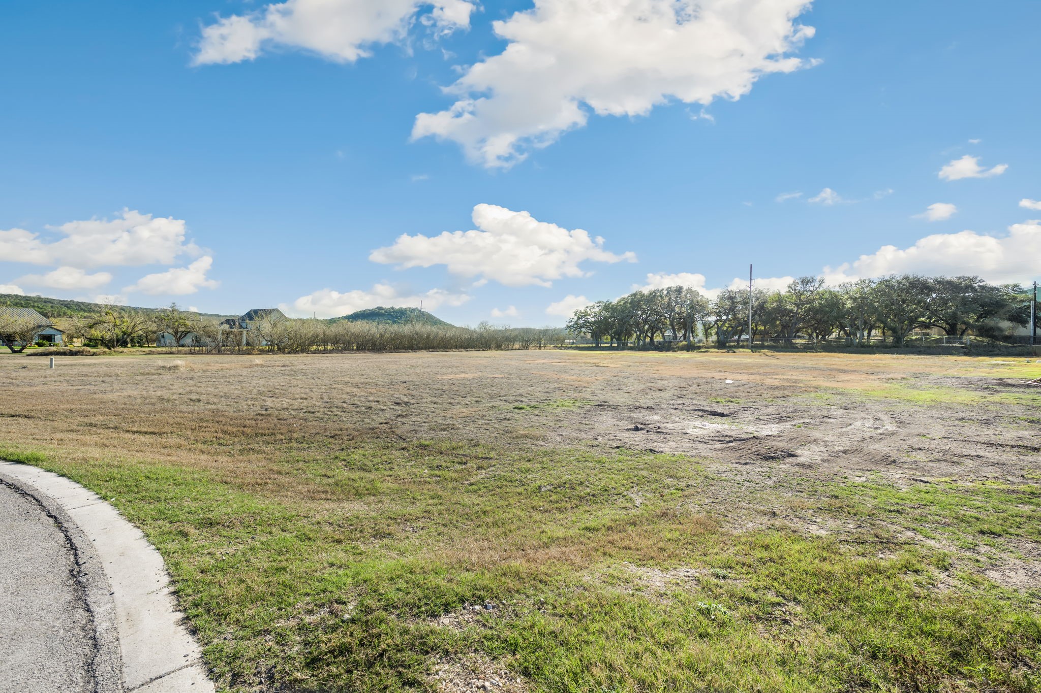 14515 Randy Lane New Braunfels, TX 78132 - Photo 3 of 11 Oxbow on the Guadalupe has paved streets and underground utilities. Homeowners benefit from no city taxes, no requirement for a specific time to build, plus a great investment opportunity since deed restrictions DO NOT prohibit short term rentals.