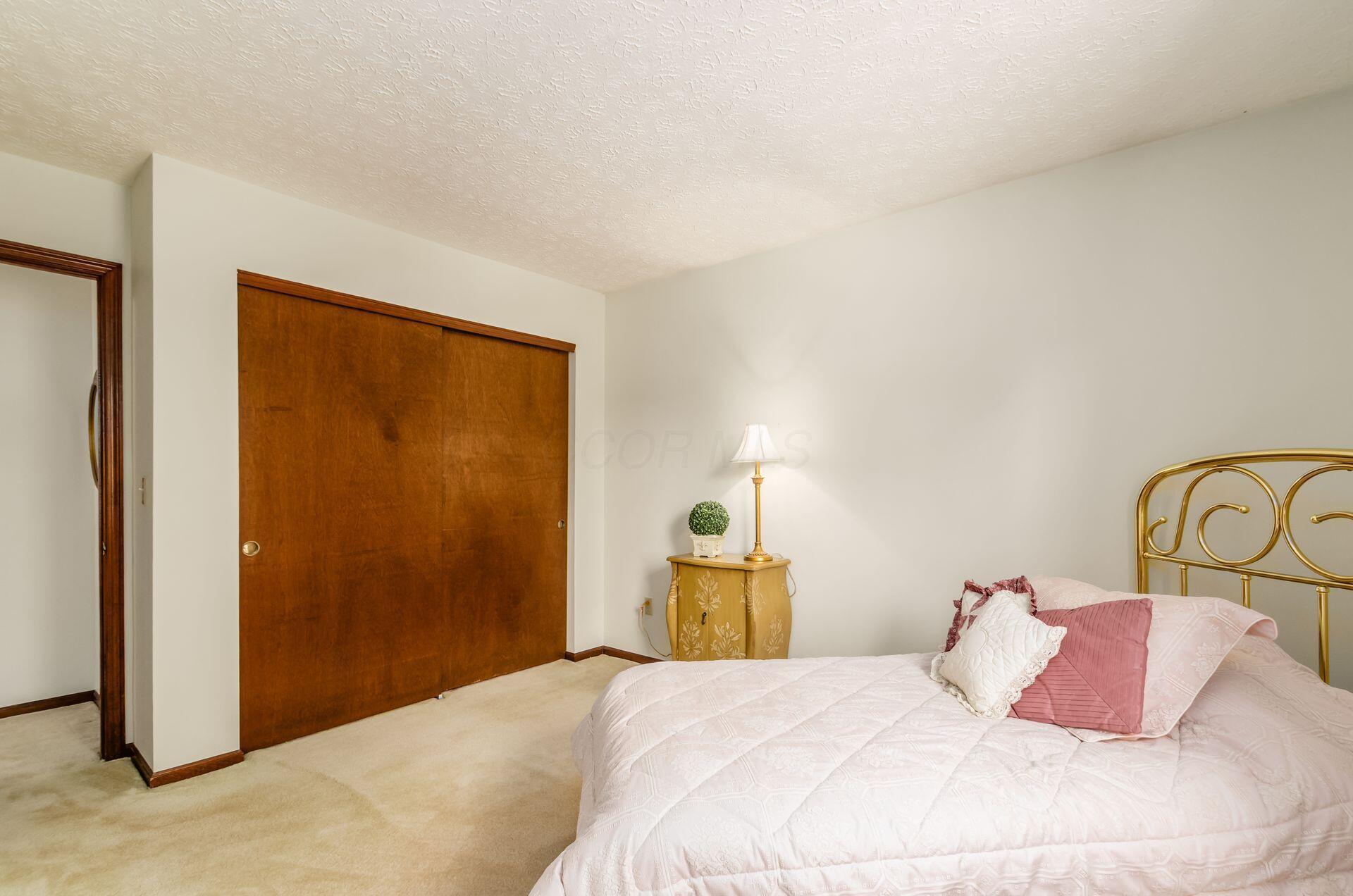 7771 Strathmoore Road Dublin, OH 43016 - Photo 25 of 32 Guest Bedroom 4 w/Sliding Door Closet