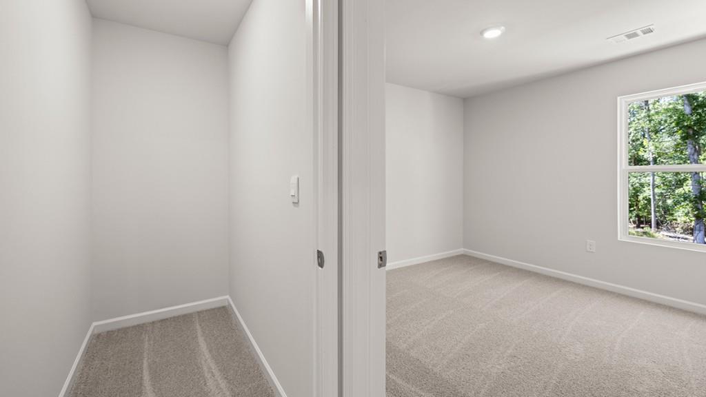 3245 Ryker Road, Unit 306 Gainesville, GA 30507 - Photo 21 of 35 an empty room with windows