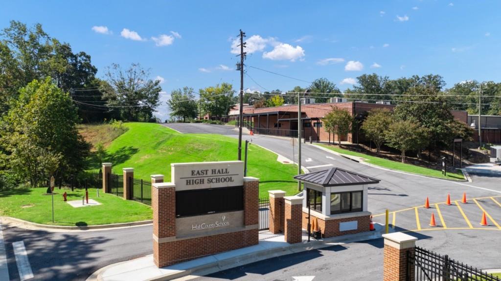 3245 Ryker Road, Unit 306 Gainesville, GA 30507 - Photo 28 of 35 a view of a patio with a table and chairs