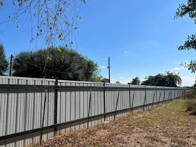 a view of a dinning room and a wooden deck