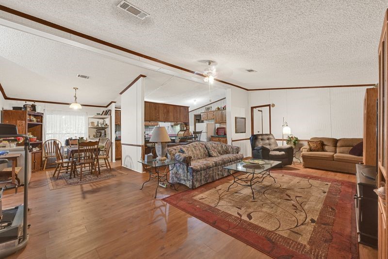 35494 Betka Road Hempstead, TX 77445 - Photo 17 of 37 a living room with lots of furniture and a large window