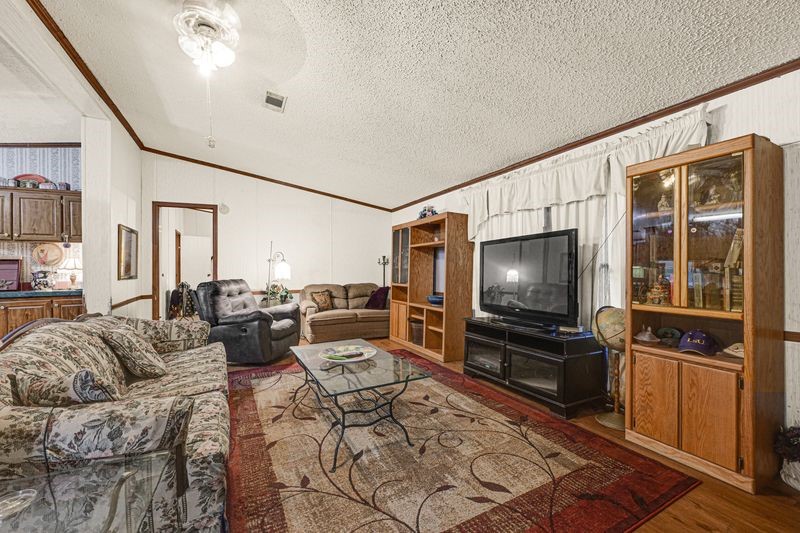 35494 Betka Road Hempstead, TX 77445 - Photo 18 of 37 a living room with furniture and a flat screen tv