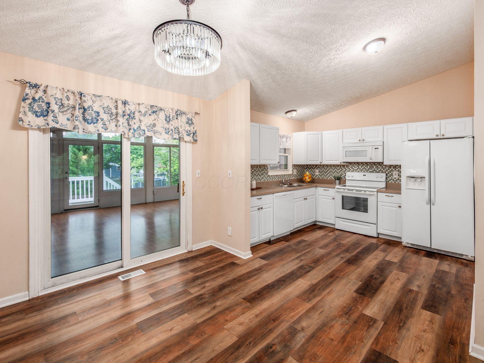 24 Ridgedale Court Powell, OH 43065 - Photo 11 of 36 Dining Room to Kitchen