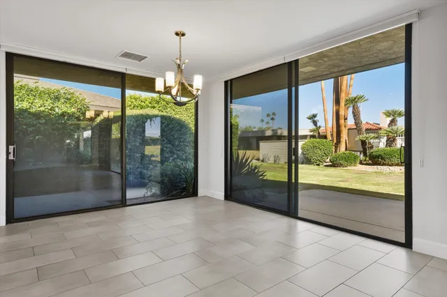 a view of a room with window and outdoor view