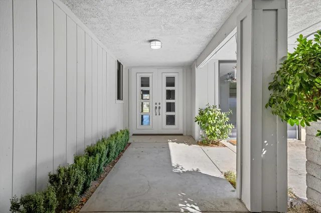 a view of a entryway door front of house
