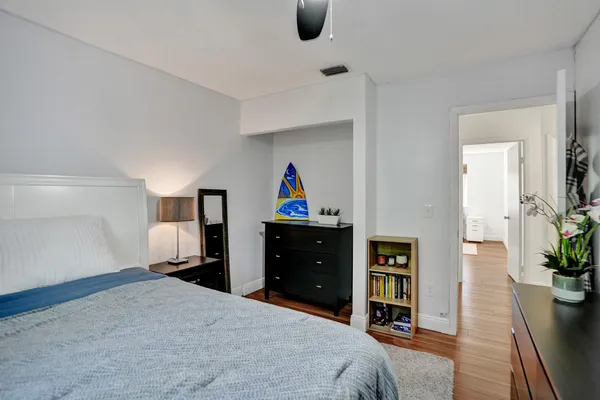 a workspace with furniture and wooden floor