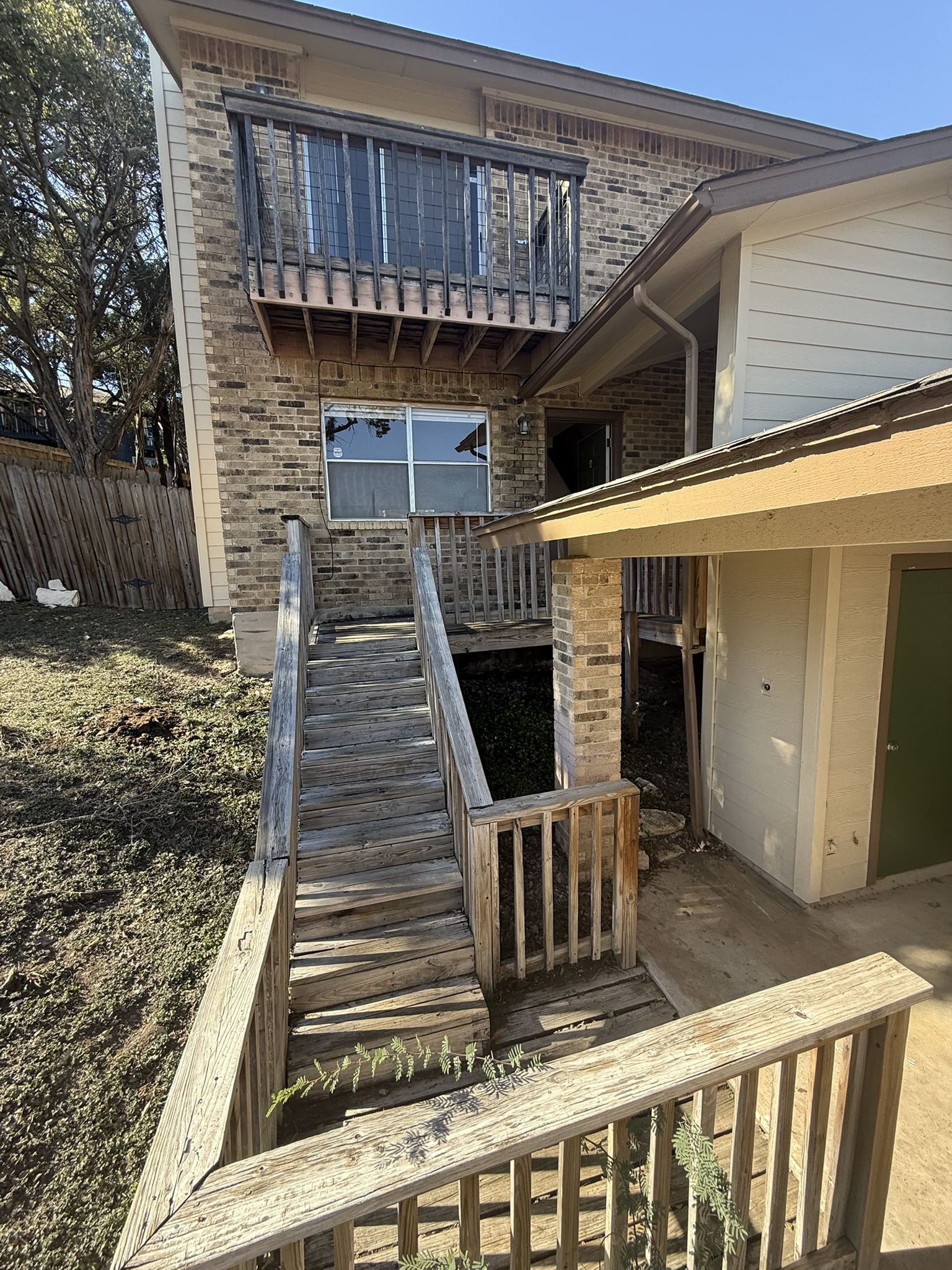 8102 Dunn Street, Unit A Austin, TX 78745 - Photo 1 of 1 a front view of a house with stairs