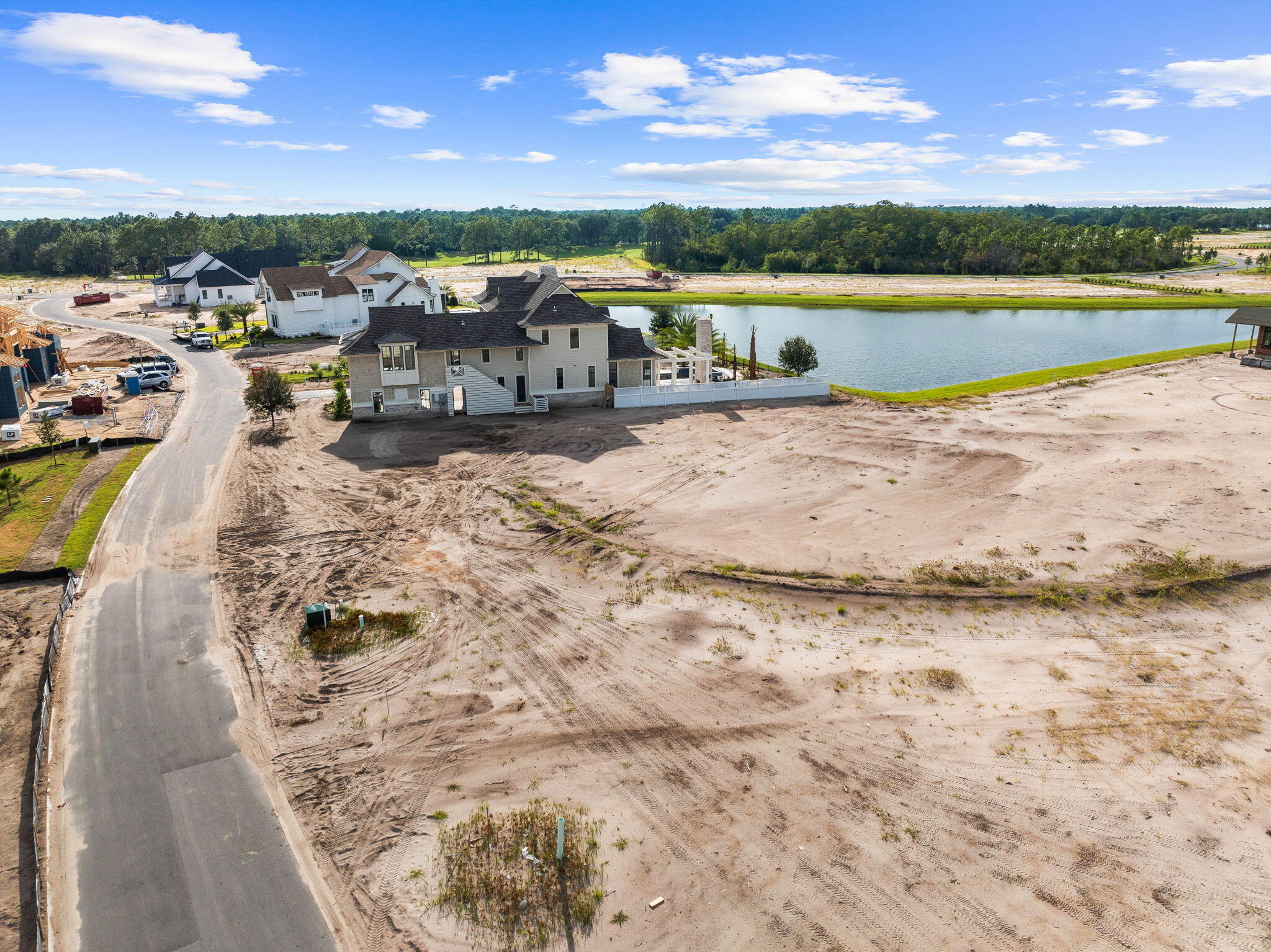 Lot 134 Morning Light Way Inlet Beach Inlet Beach, FL 32461 - Photo 13 of 28 a view of a lake with houses in the back