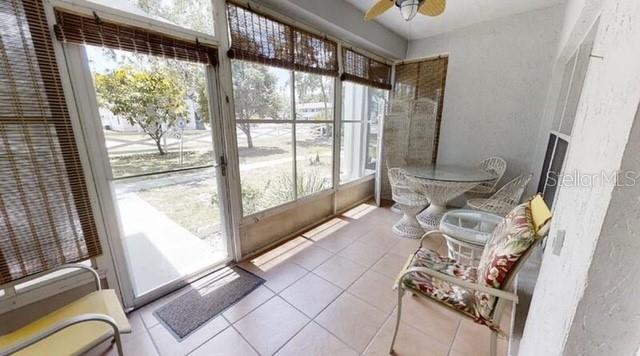 957 Southeast Mayo Drive, Unit 957 Crystal River, FL 34429 - Photo 2 of 22 a view of an outdoor space with porch area