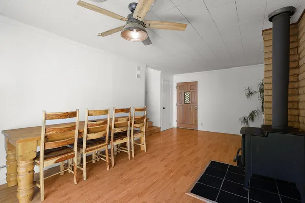 a view of a livingroom with furniture and wooden floor