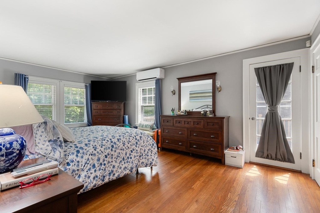 114 South Border Road Medford, MA 02155 - Photo 19 of 36 a bedroom with a bed and a dresser