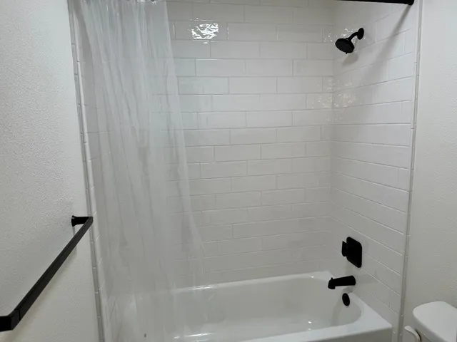 a bathroom with a bathtub