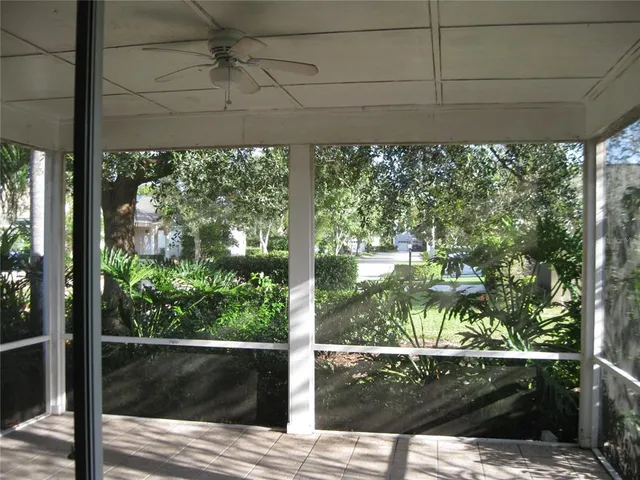a view of a back yard from a balcony