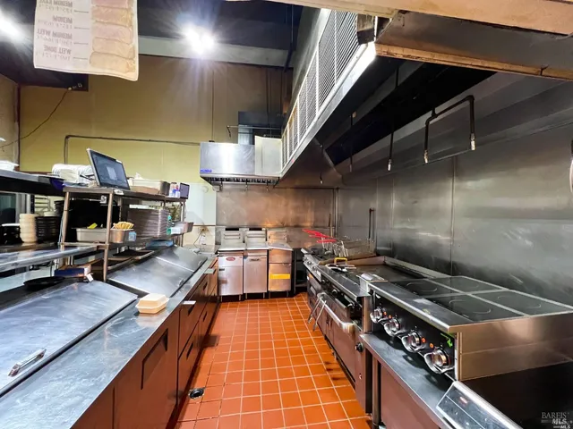 a view of a tables and chairs in a room