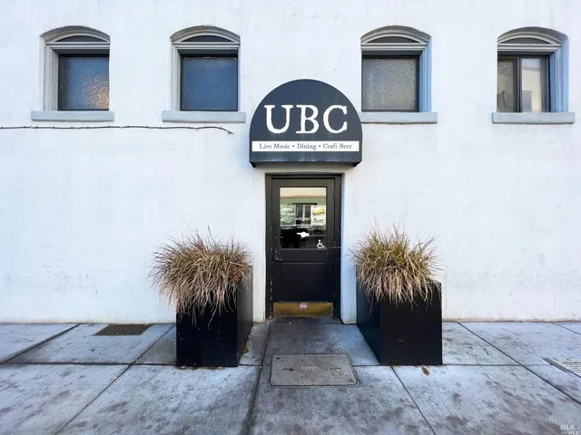 a very nice looking living room with a large window