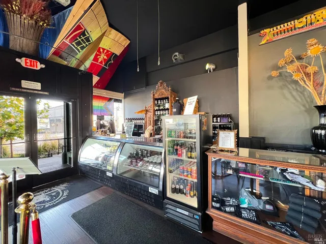 a view of a chairs and table in a patio
