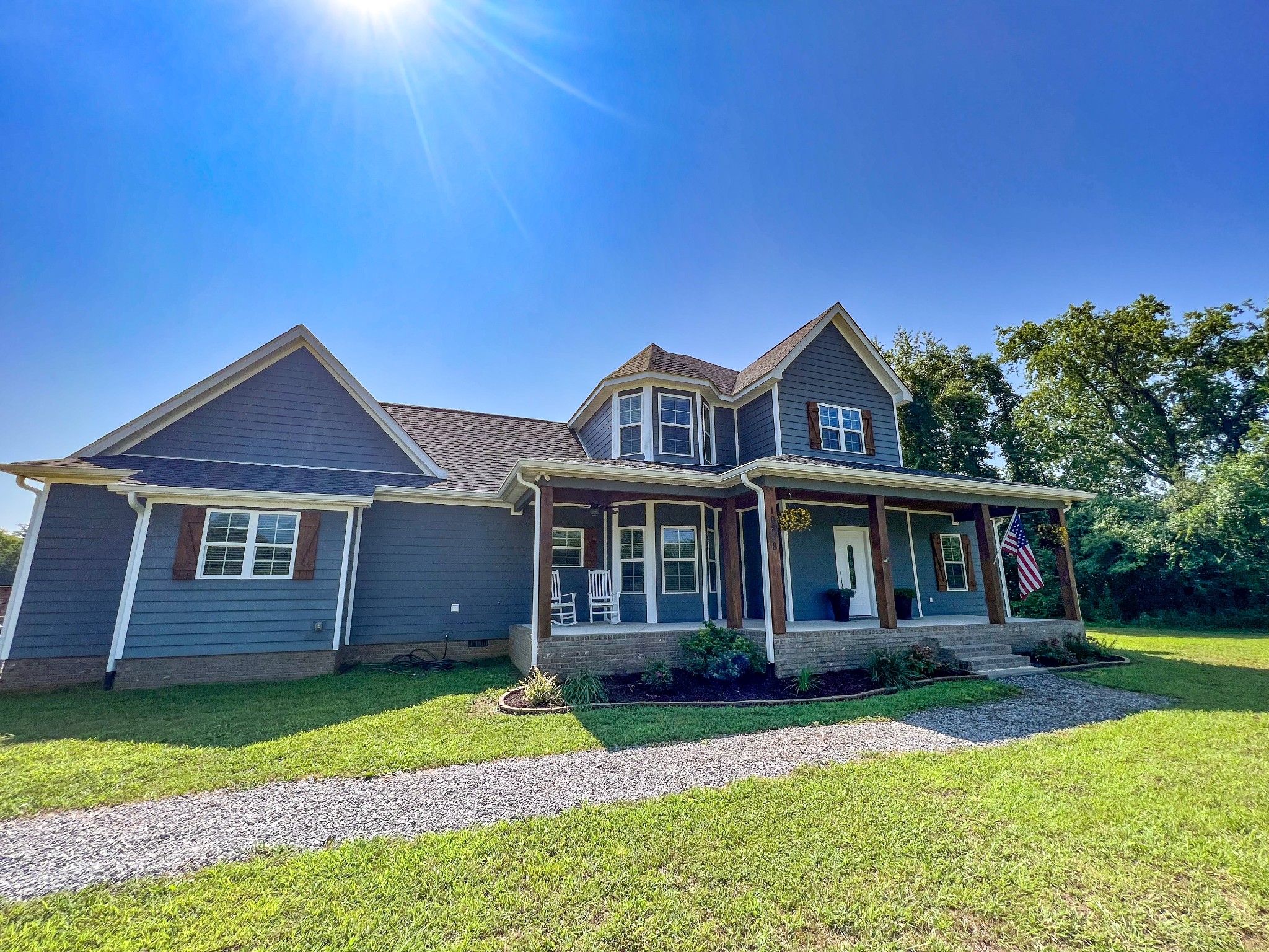 front view of a house with a yard