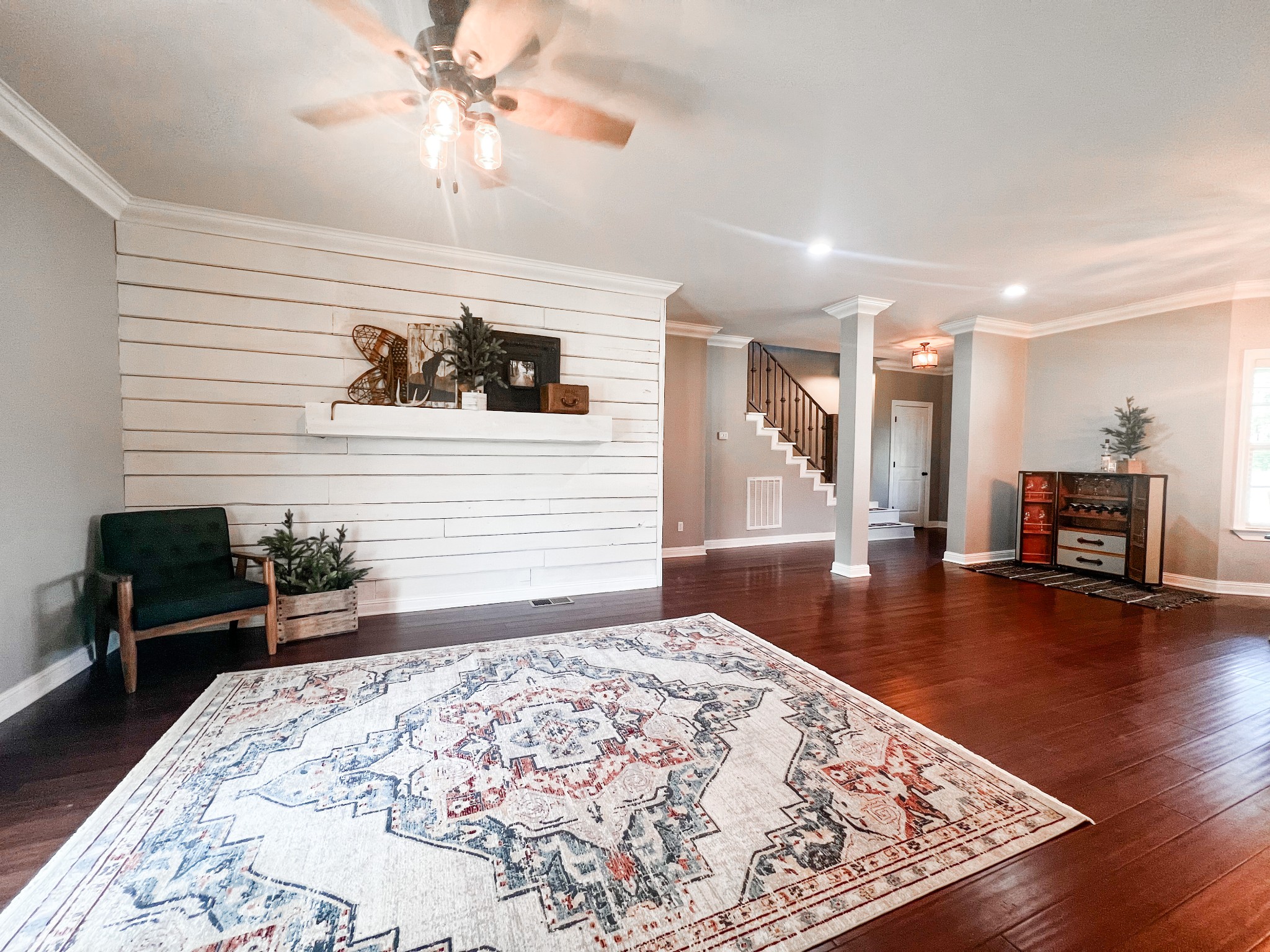 10848 Newtown Road Rockvale, TN 37153 - Photo 4 of 28 a view of a livingroom with wooden floor and a workspace
