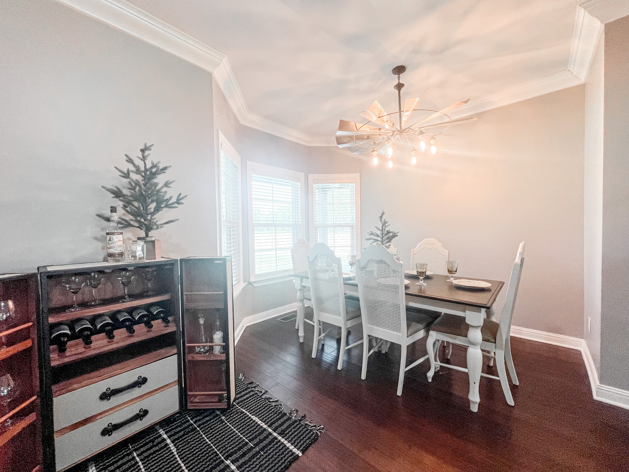 10848 Newtown Road Rockvale, TN 37153 - Photo 5 of 28 a view of a dining room with furniture and wooden floor