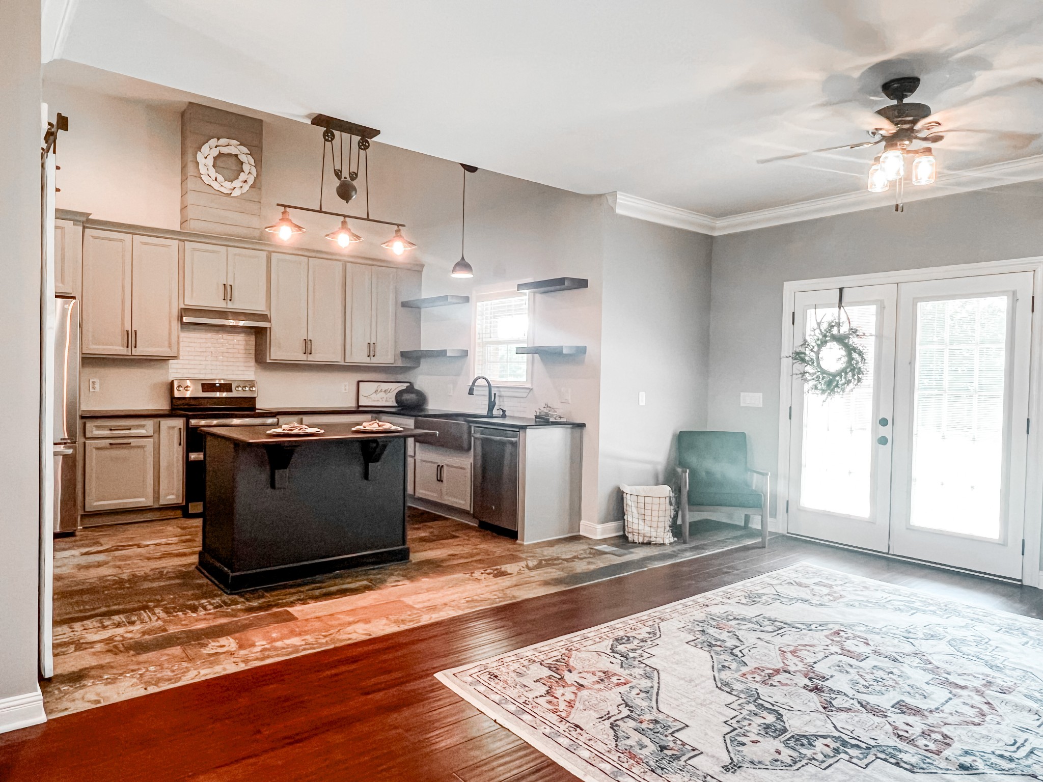 10848 Newtown Road Rockvale, TN 37153 - Photo 6 of 28 a kitchen with a stove a sink and a refrigerator