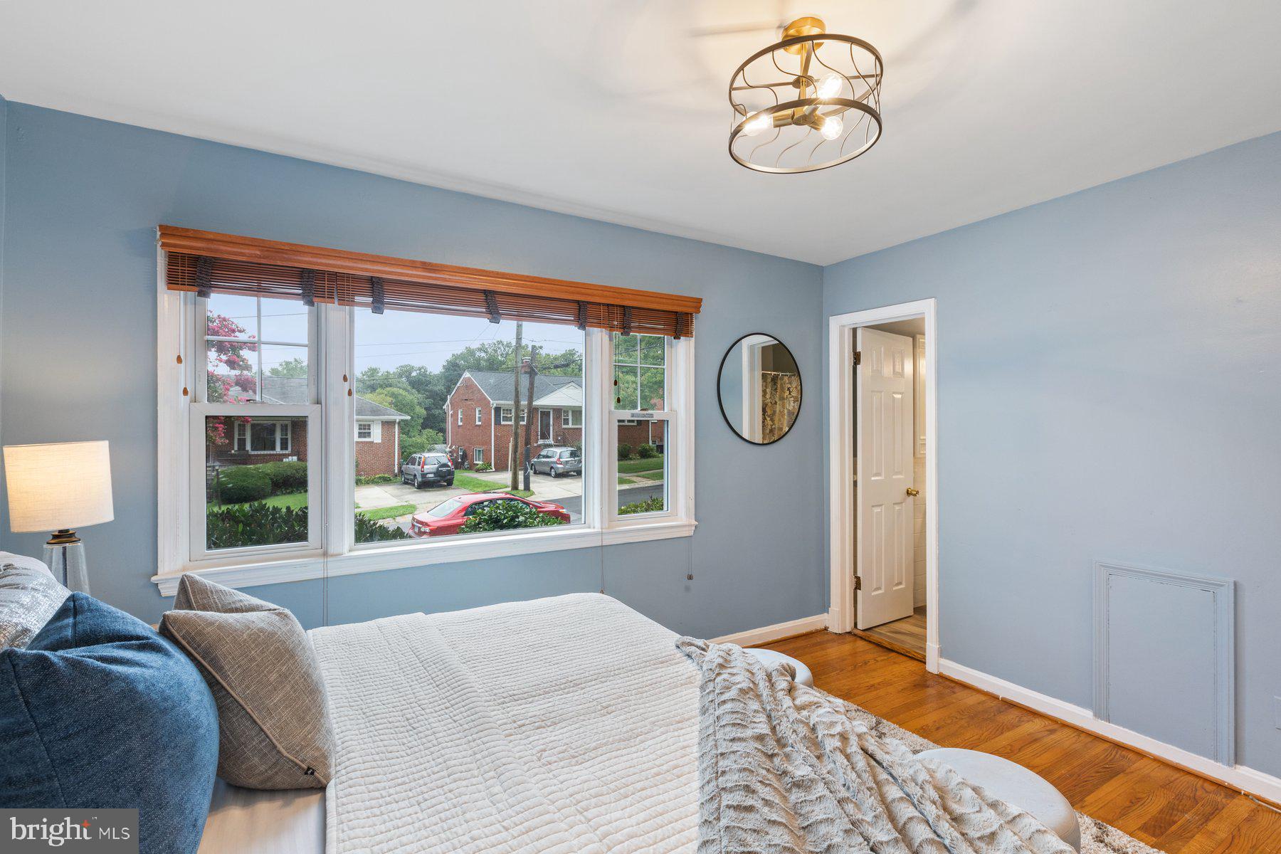 2605 Eccleston Street Silver Spring, MD 20902 - Photo 12 of 47 a bedroom with furniture and a window