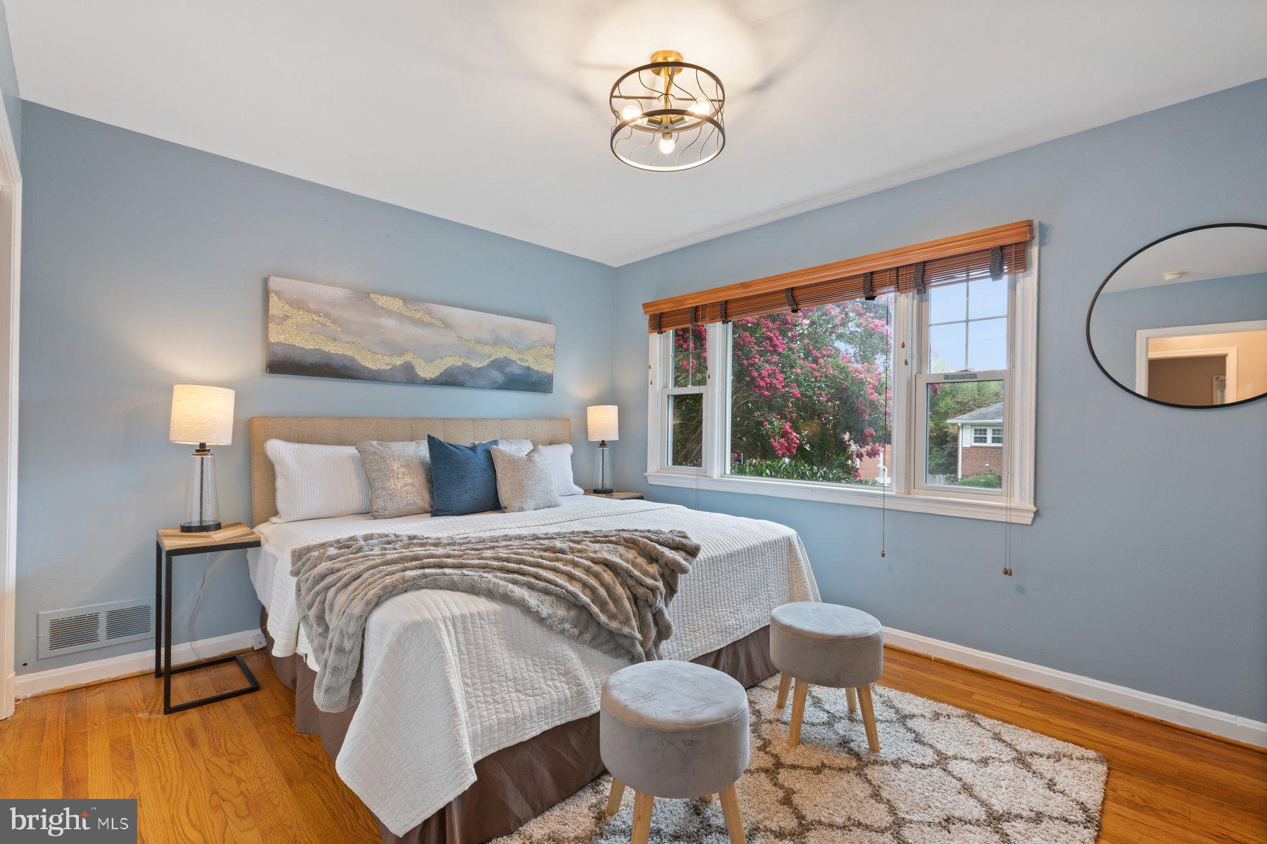 2605 Eccleston Street Silver Spring, MD 20902 - Photo 13 of 47 a bedroom with a bed and a window