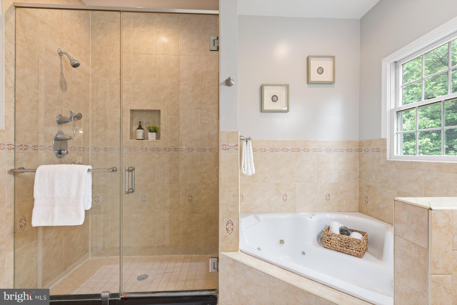 2605 Eccleston Street Silver Spring, MD 20902 - Photo 26 of 47 a bathroom with a tub and shower