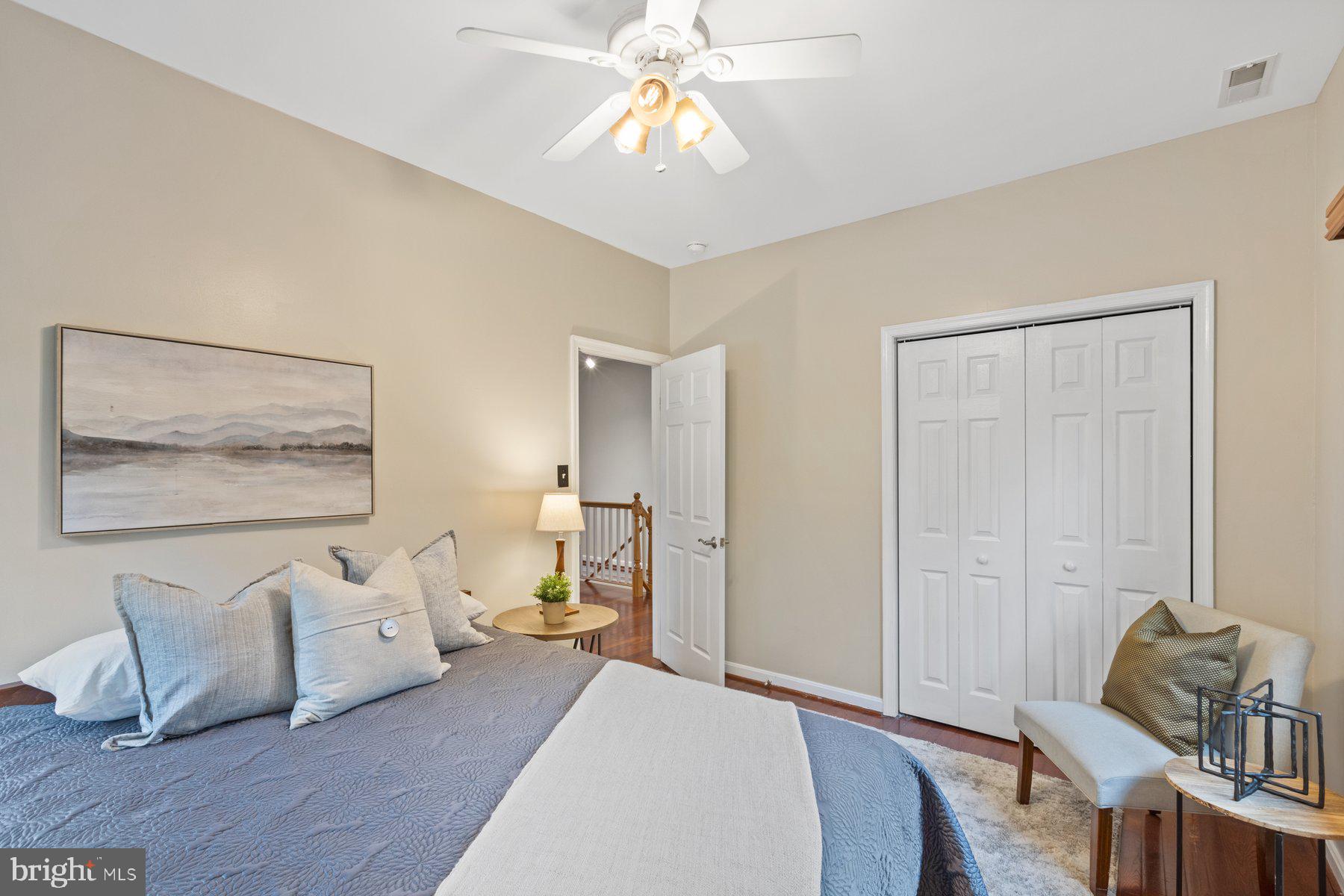 2605 Eccleston Street Silver Spring, MD 20902 - Photo 30 of 47 a bedroom with furniture and a chandelier